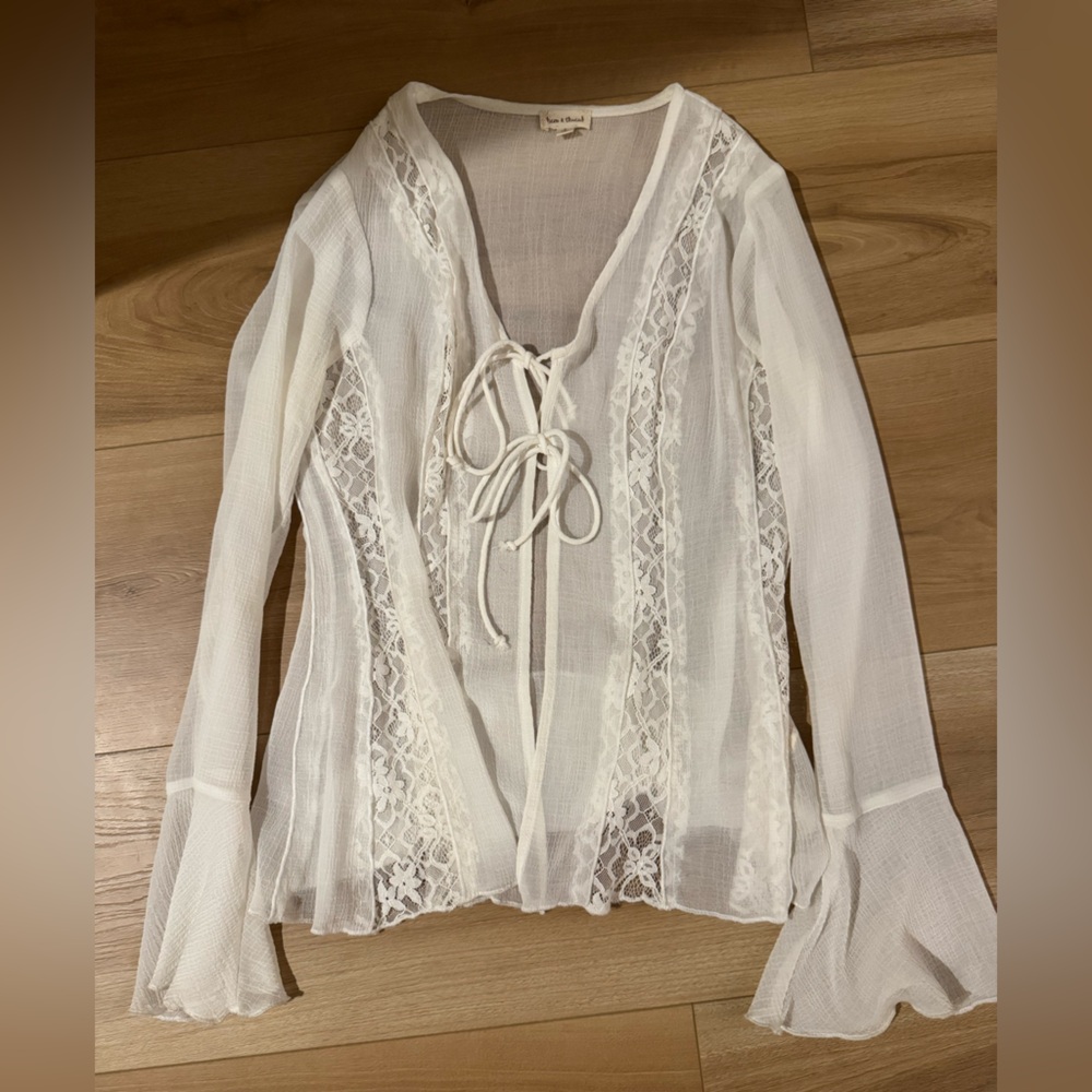 Sheer white boho laced top that ties in the front